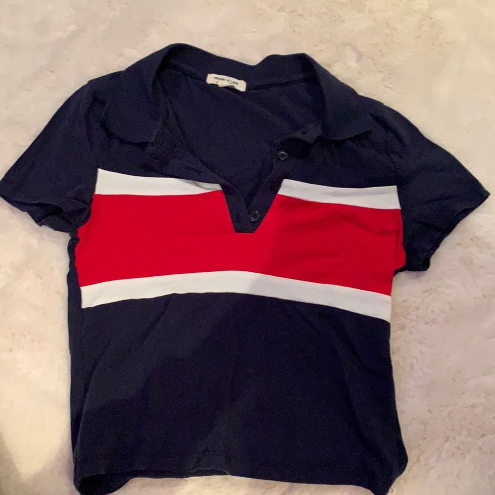 This is a relatively new shirt but sadly there is a small hole in it.